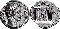 Photograph of a Roman coin: a man's head, facing right, on the obverse, with a temple with a god's statue on the reverse.
