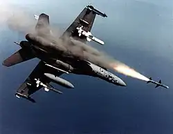 An Australian F-18A Hornet fires an AIM-7 Sparrow missile.