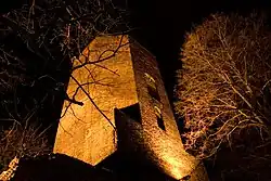 Medieval castle tower at night