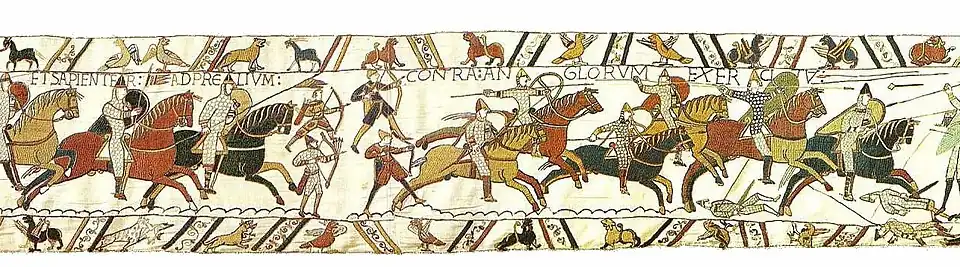 Scene 51 from the Bayeux tapestry. The horseman's spear standard at left bears three roundels.