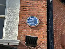 Beautiful Thing rainbow plaque on the Greenwich Tavern, seen in March 2025