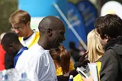Photograph of John Mutai at the finish of the Belfast Marathon in 2010, where he was runner up