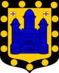 The town's coat of arms, a castle surrounded by 13 solid gold circles or heraldic bezants.