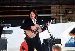 Dean performing at the Country For Kids concert in 1998 in Stafford, Virginia