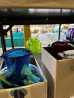 glassware in unsealed boxes