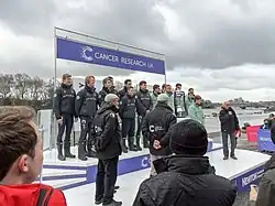 Men's Blues race coin toss