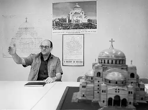 Pešić with a scale model