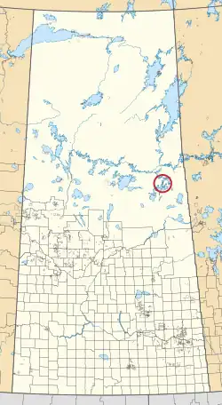 A map of the province of Saskatchewan showing 297 rural municipalities and hundreds of small Indian reserves. One is highlighted with a red circle.