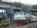 The local Bandung Raya train steams at Cimindi station