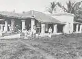 The devotees taking picture outside the temple, circa 1900-1923s