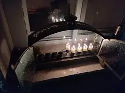 Hanukkiah next to the window