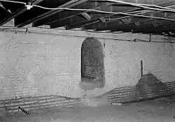 Section of foundation wall under the line of columns above the nave