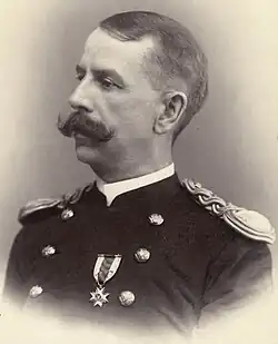 Sepia toned photo left profile of Major General Charles L. Hodges as a captain in dress uniform in 1896
