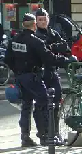 Two gendarmes mobiles in anti-riot gear