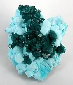 Dioptase on Chrysocolla, Otjikotu, Kunene Region, Namibia. 6.8 × 5.5 × 4.5&nbsp;cm