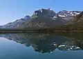 Citadel Peaks reflected in Waterton Lake. Kootenai Peak (left), Porcupine Ridge (right).