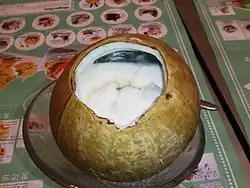 Coconut pudding served in a coconut