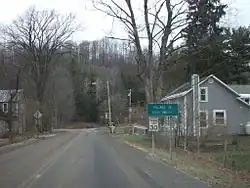 Signage entering Cold Brook via Herkimer County Route 224, approaching New York State Route 8