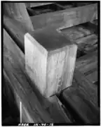 Detail of vertical King Post connection with lower chord, viewed from below with picture flipped 180 (Note kerfs in lower chord)