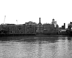 View across the Thames just downstream of Tower Bridge. This photograph was taken in 1971.
