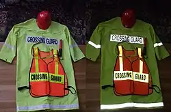 Photos of crossing guard clothing in normal light, and reflecting a point source of light.