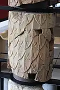 One of the peristyle columns with foliage decoration.
