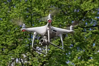 a Phantom 4 Pro Plus in the air