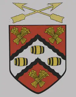 Logo of the school in red, white, black and gold, and features hops and three barrels