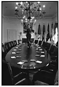 First Lady Betty Ford dances on the Cabinet room table in the White House (1977)