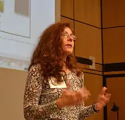 Dene Grigar speaking during the colloquium at the Digital Humanities Summer Institute, the University of Victoria, British Columbia, June 2014.