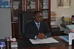 Denis Mbuyu Manga, then director of the National School of Finance.