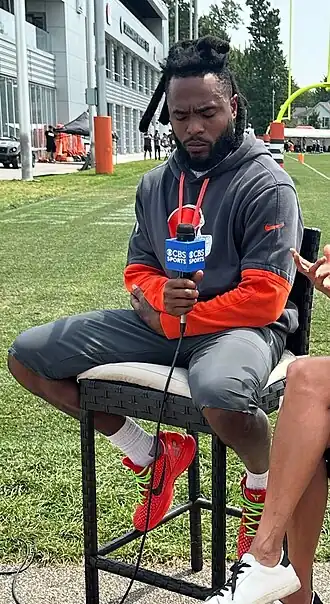 Diontae Johnson being interviewed by CBS Sports at Browns training camp in August 2025