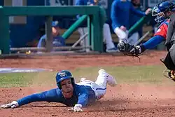 Drew Waters sliding to scoring a run for the Omaha Storm Chasers in 2024