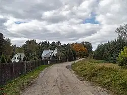 View of the road leading from Młyńsk to the neighbouring village of Iwiczno