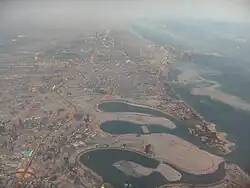 Aerial view of Al Mamzar (center-right)