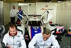 The No. 21 car in the garage of DragonSpeed at the 2016 4 Hours of Estoril
