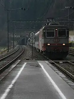 "Swiss-Express" train leaving the Albis Tunnel as seen from Sihlbrugg railway station
