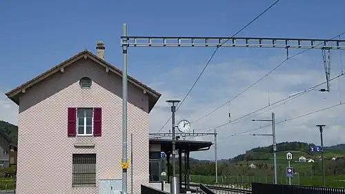 Two-story building with gabled roof