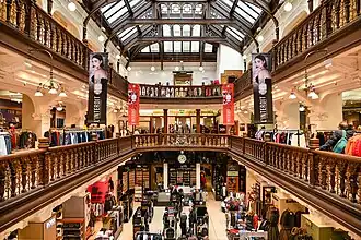 three-storey hall with wooden balconies