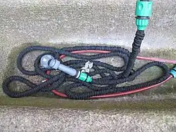 Special expandable hose can be stretched to reach farther.