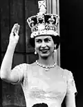 Elizabeth II wearing the Imperial State Crown from the balcony of Buckingham Palace, 1953