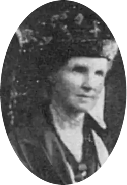 middle-aged white woman in a hat