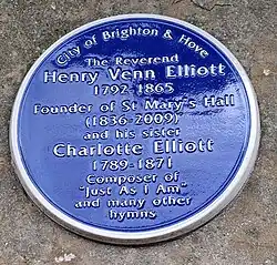 Blue Plaque on the wall outside St Mary's Hall on Eastern Road, Brighton