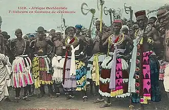 Féticheurs in ceremonial costume, hand-coloured