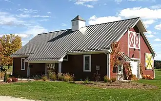 Post-frame construction building