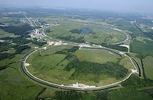 Fermilab's accelerator rings. The main injector is in the foreground, and the antiproton ring and Tevatron (inactive since 2011) are in the background.