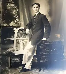 Filipino man wearing balloon pants with an oversized coat.