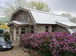 A finished slipform stone house.