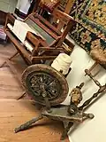 Spinning and weaving accoutrements on display.
