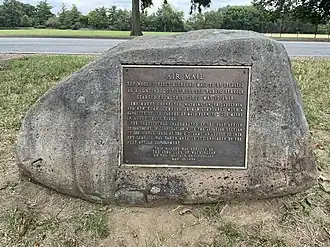 Engraved plaque on a boulder